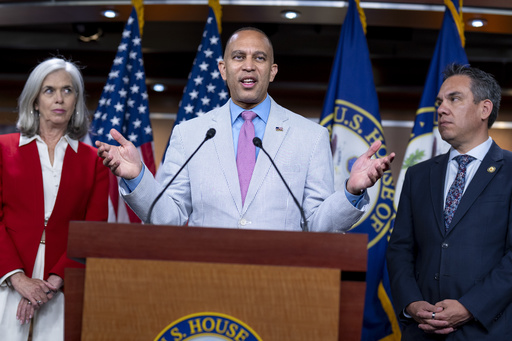 House Minority Leader Hakeem Jeffries, D-N.Y., flanked by Rep. Katherine Clark, D-Mass., left, the House minority whip, and Rep. Pete Aguilar, D-Calif., chair of the House Democratic Caucus, talks to reporters about the decision by Speaker Mike Johnson to leave Washington early as Republicans clash over the Jeffrey Epstein files, at the Capitol, Wednesday, July 23, 2025. (AP Photo/J. Scott Applewhite)
