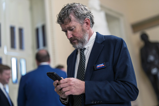 Rep. Thomas Massie, R-Ky., a libertarian-leaning deficit hawk, walks to the House chamber as Republicans work to push President Donald Trump's signature bill of tax breaks and spending cuts across the finish line even as conservative and moderate GOP holdouts like Massie slow that effort, at the Capitol in Washington, Wednesday, July 2, 2025. (AP Photo/J. Scott Applewhite)