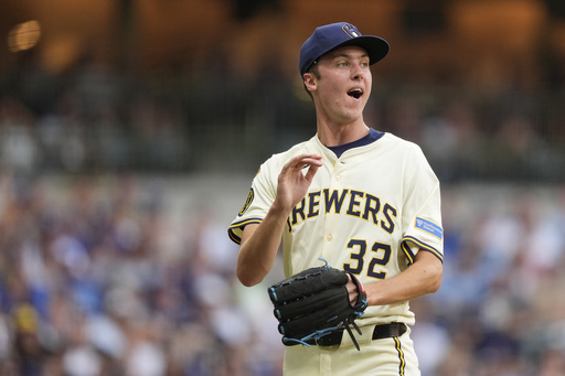 Milwaukee Brewers' Jacob Misiorowski reacts after striking out Los Angeles Dodgers' Freddie Freeman during the third inning of a baseball game Tuesday, July 8, 2025, in Milwaukee. (AP Photo/Aaron Gash)
