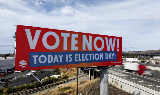 FILE - A billboard urges drivers to vote on Election Day in Union City, Calif., Nov. 5, 2024. (AP Photo/Noah Berger, File)