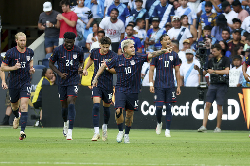 United States midfielder Diego Luna (10) celebrates after scoring a goal during the first half of a CONCACAF Gold Cup semifinal soccer match against Guatemala, Wednesday, July 2, 2025, in St. Louis. (AP Photo/Scott Kane)