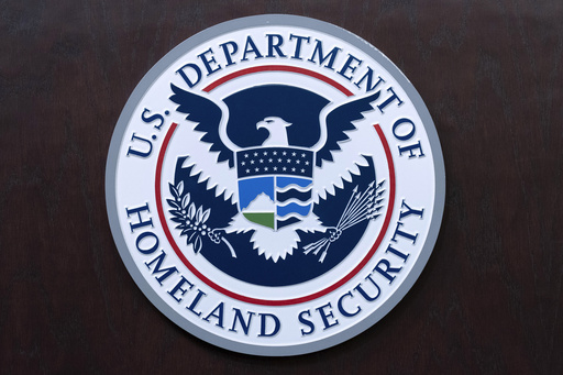 FILE - The seal of U.S. Department of Homeland Security is seen before the news conference with Acting director of U.S. Immigration and Customs Enforcement (ICE) Todd Lyons at ICE Headquarters, in Washington, on May 21, 2025. (AP Photo/Jose Luis Magana, File)