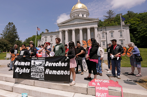 Members of Migrant Justice, a community group advocating for migrant farmworkers' rights, hold a rally outside the Vermont Statehouse in Montpelier, Vt., on Friday, June 13, 2025. (AP Photo/Amanda Swinhart)