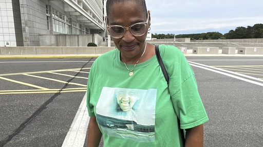 Elizabeth Alvarado stands outside federal court in Central Islip, N.Y., on Wednesday, July 2, 2025, wearing a shirt bearing an image of her daughter, Nisa Mickens, who was slain by MS-13 gang members in 2016. (AP Photo/Philip Marcelo)