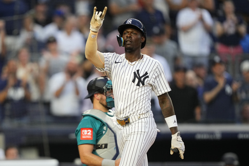 New York Yankees' Jazz Chisholm Jr. reacts after hitting a home run during the third inning of a baseball game against the Seattle Mariners, Wednesday, July 9, 2025, in New York. (AP Photo/Yuki Iwamura)