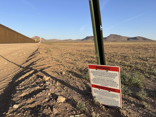 A sign warns against unauthorized entry into a militarized zone along the southern U.S. border in New Mexico on June 12, 2025. (AP Photo/Morgan Lee)