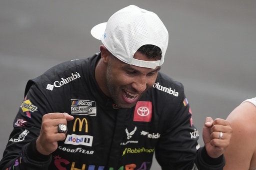Bubba Wallace reacts after winning a NASCAR Cup Series auto race at Indianapolis Motor Speedway, Sunday, July 27, 2025, in Indianapolis. (AP Photo/Darron Cummings)