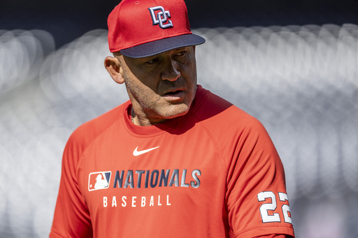 FILE - Washington Nationals bench coach Miguel Cairo looks on during batting practice before a baseball game against the San Diego Padres, June 23, 2025, in San Diego. (AP Photo/Tony Ding, File)