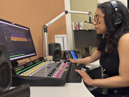 Elayna Cunningham, a college student interning at Koahnic Broadcast Corp., records a program on July 10, 2025, at the Anchorage, Alaska, studios of KNBA, the flagship station for National Native News. (AP Photo/Mark Thiessen)