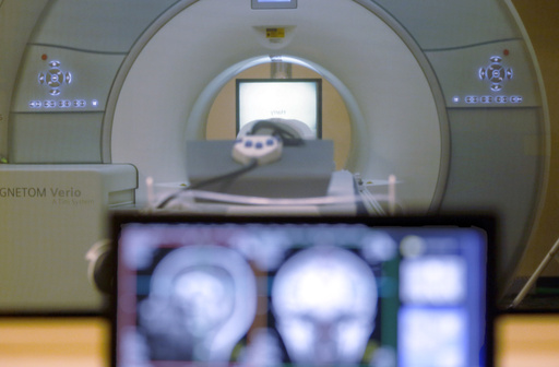 FILE - A brain-scanning MRI machine is seen in Pittsburgh, Nov. 26, 2014. (AP Photo/Keith Srakocic, File)