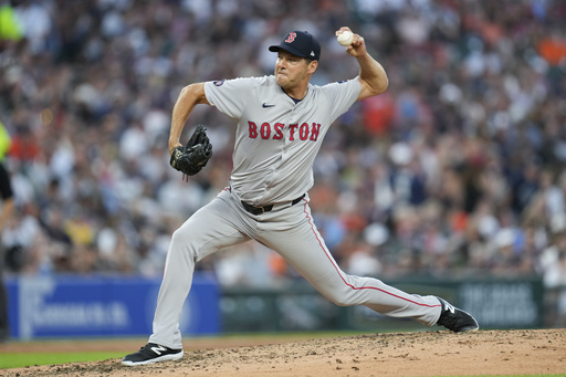 FILE - Boston Red Sox pitcher Rich Hill throws against the Detroit Tigers in the seventh inning of a baseball game, Aug. 31, 2024, in Detroit. (AP Photo/Paul Sancya, File)