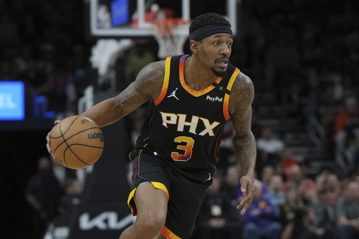 FILE - Phoenix Suns guard Bradley Beal (3) dribbles against the Oklahoma City Thunder during the first half of an NBA basketball game, Wednesday, April 9, 2025, in Phoenix. (AP Photo/Rick Scuteri, File)
