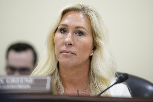 FILE - Rep. Marjorie Taylor-Greene, R-Ga., presides over a House Committee hearing on Capitol Hill, Feb. 12, 2025, in Washington. (AP Photo/Rod Lamkey, Jr., File)