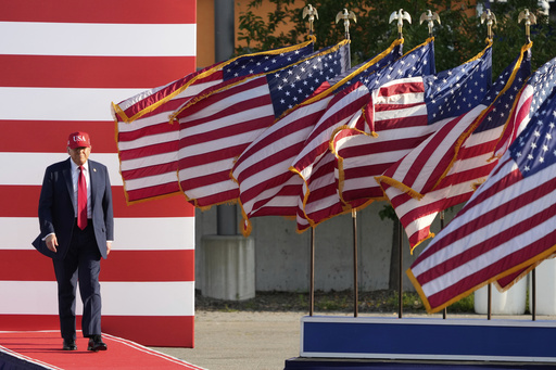 President Donald Trump arrives to speak at a rally at the Iowa State Fairgrounds, Thursday, July 3, 2025, in Des Moines, Iowa. (AP Photo/Charlie Neibergall)