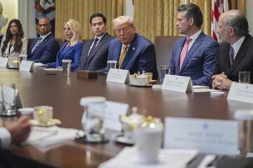 President Donald Trump, center, speaking during a cabinet meeting with from l-r., Homeland Security Secretary Kristi Noem, Secretary of Housing, Eric Scott Turner, Attorney General Pam Bondi, Secretary of State Marco Rubio, Secretary of Defense Pete Hegseth, and Secretary of Energy Chris Wright at the White House, Tuesday, July 8, 2025, in Washington. (AP Photo/Evan Vucci)