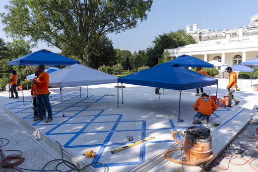 Construction continues in the Rose Garden of the White House, Friday, July 25, 2025, in Washington. (AP Photo/Alex Brandon)