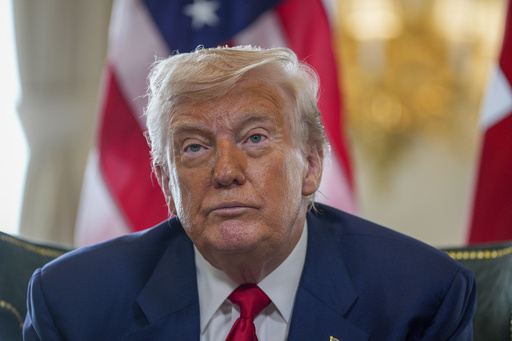U.S. President Donald Trump talks to the media as he meets with British Prime Minister Keir Starmer at Trump Turnberry golf club in Turnberry, Scotland, Monday, July 28, 2025. (Christopher Furlong/Pool Photo via AP)