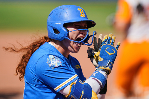 FILE - UCLA's Megan Grant (43) rounds the bases after hitting a home run during an NCAA softball Women's College World Series elimination game against Tennessee, Sunday, June 1, 2025 in Oklahoma City. (AP Photo/Vera Nieuwenhuis, File)