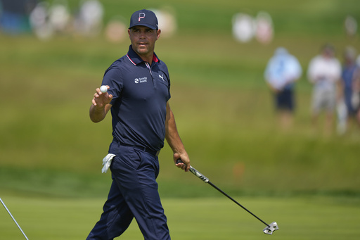 Gary Woodland reacts after making a putt on the 10th hole during the first round of the U.S. Open golf tournament at Oakmont Country Club Thursday, June 12, 2025, in Oakmont, Pa. (AP Photo/Charlie Riedel)