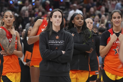 Indiana Fever's Caitlin Clark watches following a WNBA All-Star basketball game against Team Collier, Saturday, July 19, 2025, in Indianapolis. (AP Photo/Michael Conroy)