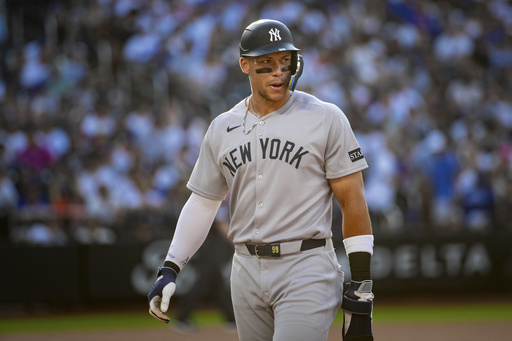 New York Yankees' Aaron Judge leaves the field after not scoring in the eighth inning of a baseball game against the New York Mets, Saturday, July 5, 2025, in New York. (AP Photo/Angelina Katsanis)