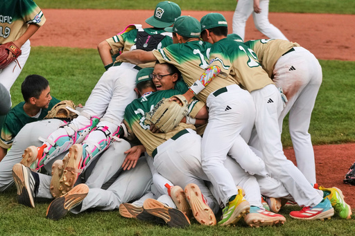 Taiwan players celebrate after winning the Little League World Series Championship baseball game against Las Vegas, Nev., in South Williamsport, Pa., Sunday, Aug. 24, 2025. (AP Photo/Gene J. Puskar)