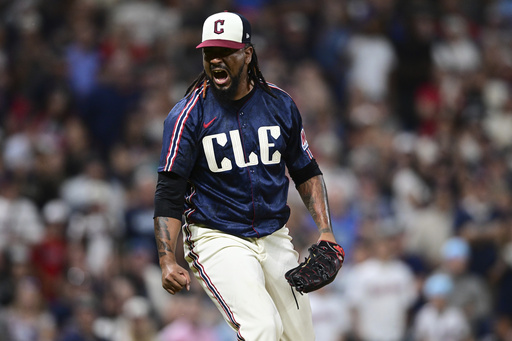 Cleveland Guardians relief pitcher Emmanuel Clase reacts after the Guardians defeated the Athletics in a baseball game, Friday, July 18, 2025, in Cleveland. (AP Photo/David Dermer)