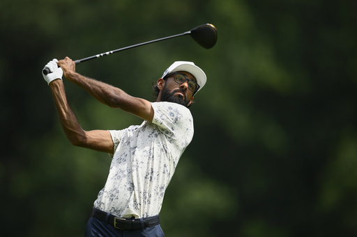 Akshay Bhatia hits from the seventh tee during the first round of the BMW Championship golf tournament Thursday, Aug. 14, 2025, in Owings Mills, Md. (AP Photo/Nick Wass)