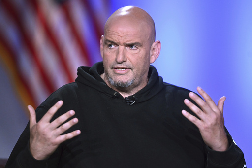 FILE - Sen. John Fetterman, D-Pa., participates in a debate with Sen. Dave McCormick, R-Pa., not shown, at the Edward M. Kennedy Institute for the United States Senate, June 2, 2025, in Boston, as live-streamed on Fox Nation. (AP Photo/Steven Senne)