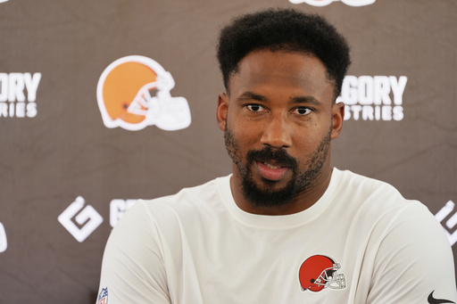 Cleveland Browns defensive end Myles Garrett speaks during a news conference before practice at the team's NFL football training camp Wednesday, July 23, 2025, in Berea, Ohio. (AP Photo/Sue Ogrocki)