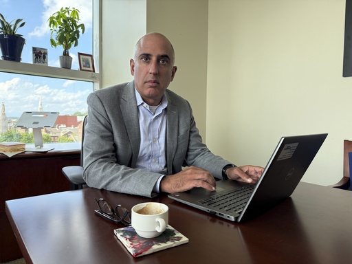 Dr. Ateev Mehrotra, a professor at Brown University's school of public health, and co-author of a study on how popular artificial intelligence chatbots respond to questions about suicide is photographed in his office on Monday, August. 25, 2025 in Providence, R.I. (AP Photo/Matt O'Brien)