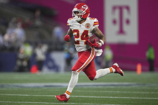 Kansas City Chiefs wide receiver Skyy Moore (24) runs a punt return for a touchdown during the second half of an NFL preseason football game against the Seattle Seahawks, Friday, Aug. 15, 2025, in Seattle. (AP Photo/Lindsey Wasson)