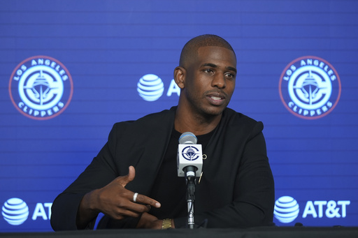 Chris Paul is introduced as the newest member of the Los Angeles Clippers during a basketball news conference at Intuit Dome in Inglewood, Calif., Monday, July 28, 2025. (AP Photo/Damian Dovarganes)