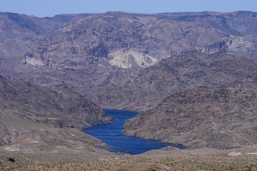 FILE - The Colorado River cuts through Black Canyon, June 6, 2023, near White Hills, Ariz. (AP Photo/Matt York, File)