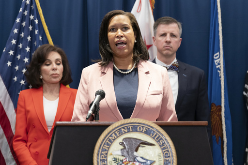 FILE - Mayor of the District of Columbia Muriel Bowser speaks as U.S. Attorney Jeanine Ferris Pirro, left, listens during a news conference in Washington, May 22, 2025. (AP Photo/Jose Luis Magana, File)