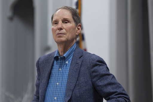 Sen. Ron Wyden, D-Ore., listens during a town hall meeting on Friday, July 25, 2025, in Wasco, Ore. (AP Photo/Jenny Kane)