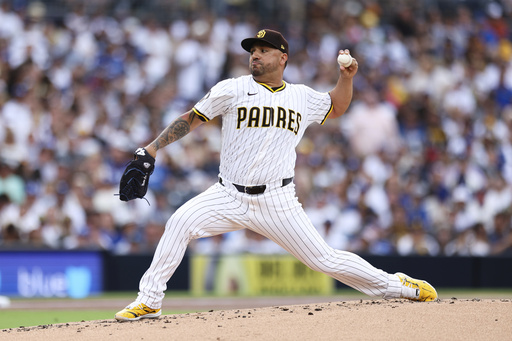 San Diego Padres starting pitcher Nestor Cortes works against the Los Angeles Dodgers in the second inning of a baseball game Saturday, Aug. 23, 2025, in San Diego. (AP Photo/Derrick Tuskan)