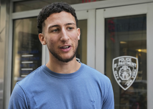 Yasin El Sammak is interviewed outside the New York City Police Department's 17th Precinct, Wednesday, Aug. 27, 2025. (AP Photo/Richard Drew)