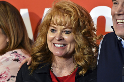FILE - Stacy Garrity, the Republican state treasurer of Pennsylvania, poses for photos at a campaign event at the Beerded Goat Brewing Co., Thursday, April 25, 2024, in Harrisburg, Pa. (AP Photo/Marc Levy,File)