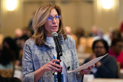 FILE - Rita Hart, chair of the Iowa Democratic Party, speaks before a vote for new calendar lineup for the early stages of the party's presidential nominating contests during the Democratic National Committee Winter Meeting, Feb. 4, 2023, in Philadelphia. (AP Photo/Matt Rourke, File)