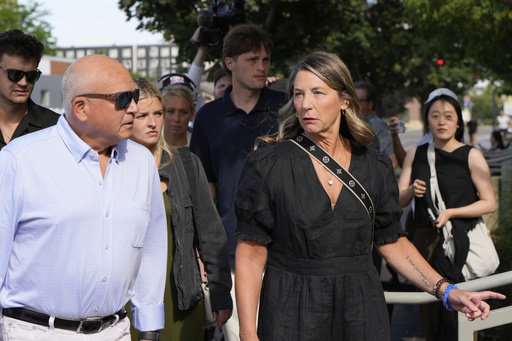 FILE - The family of Ethan Chapin, including mother Stacy Chapin, right, and father Jim Chapin, walk to the Ada County Courthouse for Bryan Kohberger's plea deal hearing, on July 2, 2025, in Boise, Idaho. (AP Photo/Jenny Kane, File)