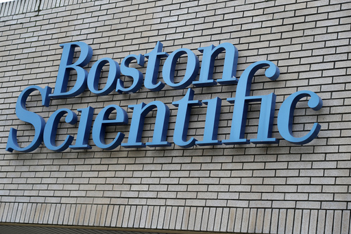 FILE - The Boston Scientific logo is seen at company offices in Fremont, Calif., Feb. 1, 2017. (AP Photo/Marcio Jose Sanchez, File)