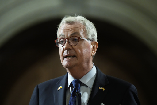 FILE - New Jersey Governor Phil Murphy delivers his State of the State address to a joint session of the Legislature at the Statehouse, Jan. 9, 2024, in Trenton, N.J. (AP Photo/Matt Rourke, File)