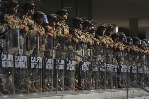 FILE - California National Guard members are positioned at the Federal Building in downtown Los Angeles, on June 10, 2025. (AP Photo/Eric Thayer, File)