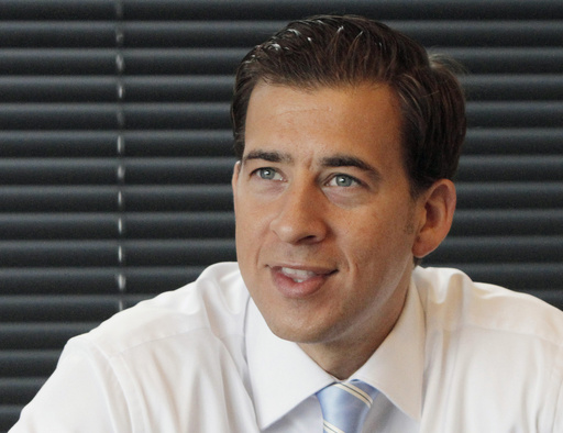 FILE - In this Oct. 18, 2010 file photo, then-Illinois Democratic U.S. Senate candidate Alexi Giannoulias speaks during an interview with the Associated Press in Chicago. (AP Photo/M. Spencer Green, File)