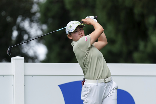 Akie Iwai, of Japan, hits off the 15th tee during the first round of the LPGA Portland Classic golf tournament at Columbia Edgewater in Portland, Ore., Thursday, Aug. 14, 2025. (AP Photo/Ali Gradischer)