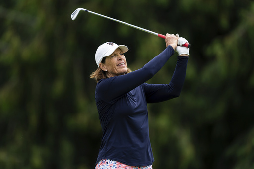 Juli Inkster, of the United States, hits off the second tee during the first round of the LPGA Portland Classic golf tournament at Columbia Edgewater in Portland, Ore., Thursday, Aug. 14, 2025. (AP Photo/Ali Gradischer)