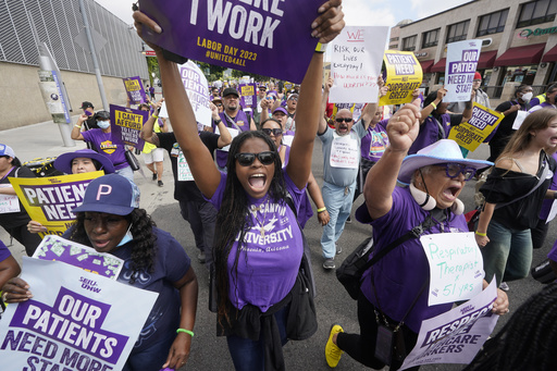 FILE - Frontline healthcare workers hold a demonstration on Labor Day outside Kaiser Permanente Los Angeles Medical Center in Hollywood in Los Angeles, Sep. 4, 2023. (AP Photo/Damian Dovarganes, File)