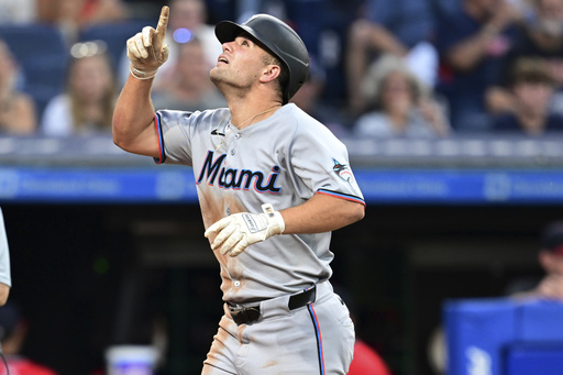 Miami Marlins' Jakob Marsee runs the bases after hitting a two-run home run off Cleveland Guardians relief pitcher Matt Festa during the fifth inning of a baseball game, Wednesday, Aug. 13, 2025, in Cleveland. (AP Photo/David Dermer)