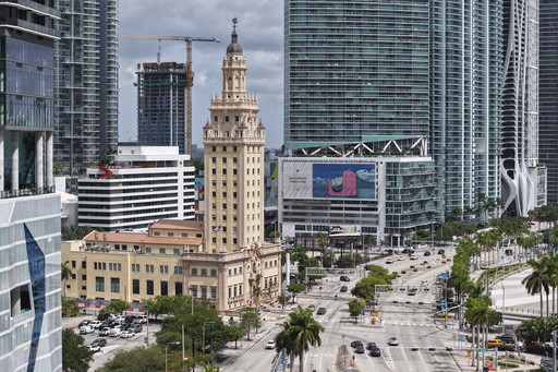 The Freedom Tower is seen in downtown Miami on Friday, Aug. 8, 2025. (AP Photo/Daniel Kozin)